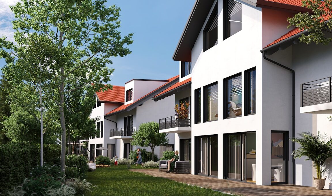 a row of white houses with a red roof